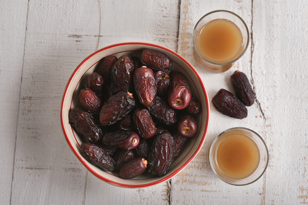 Arabic coffee Qahwa with fresh Medjool dates,  Kahwah and dry dates